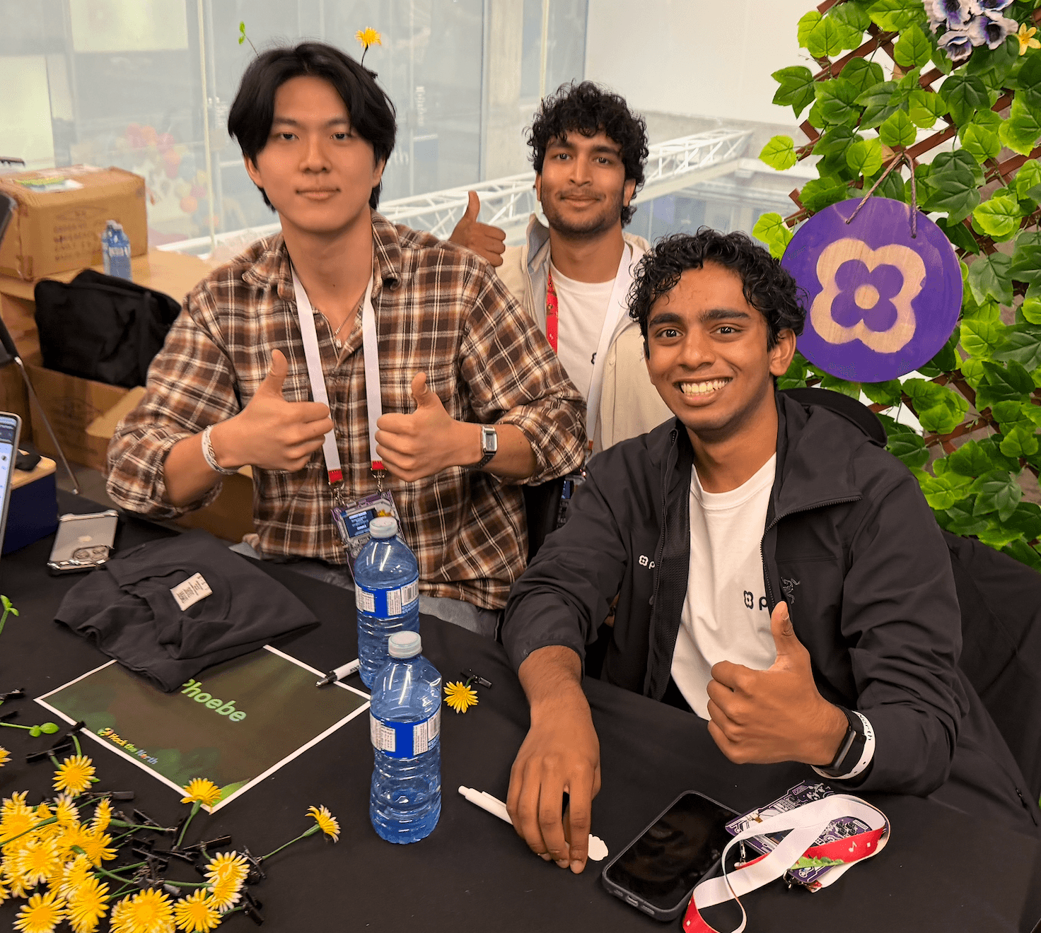 Attendees at the Phoebe booth at Hack the North